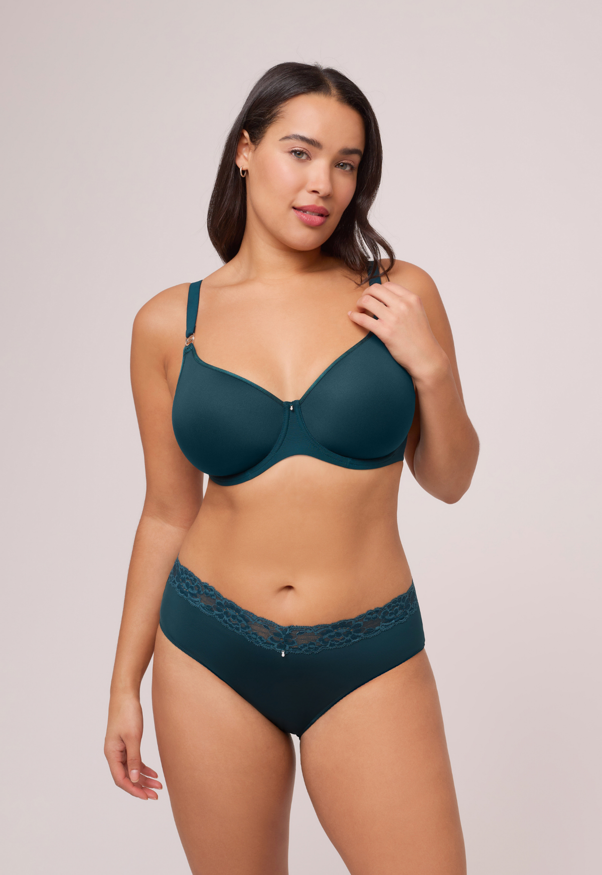 Model wearing the Sublime Spacer T-Shirt Bra in Deep Spruce and matching lace-trim briefs