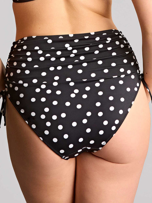 Black and white polka dot mid rise adjustable bikini set on a neutral background