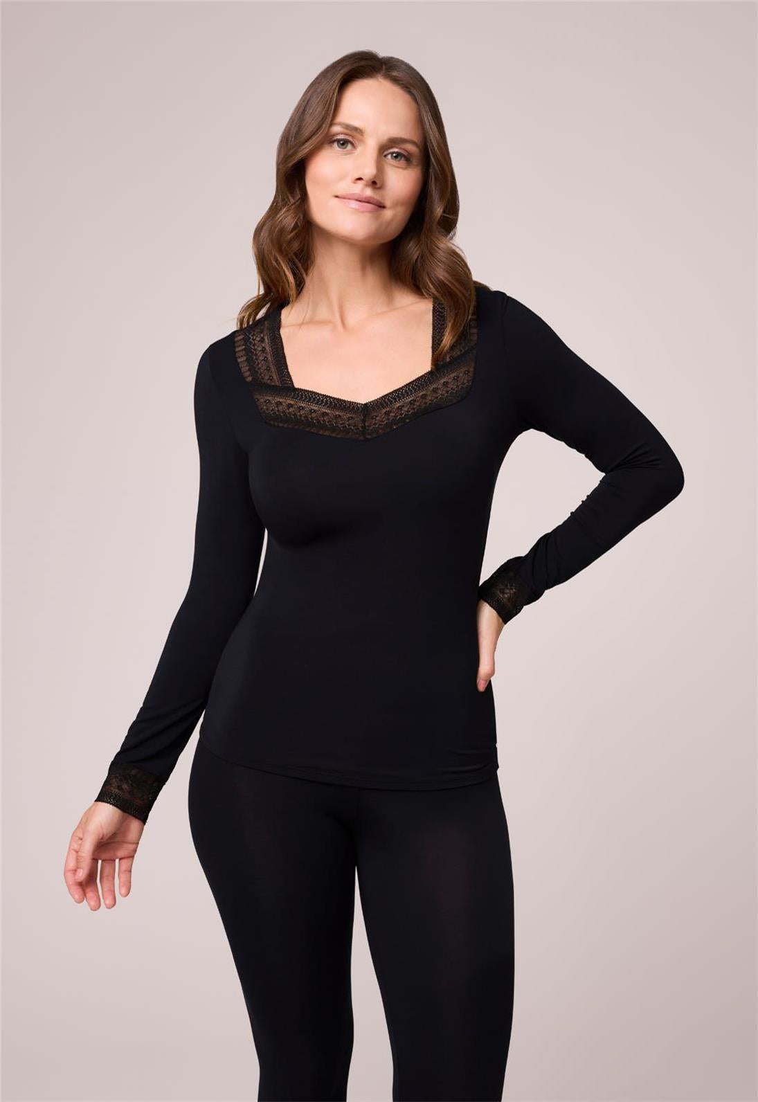 Bodybliss Long Sleeve Top in Black worn by model front view