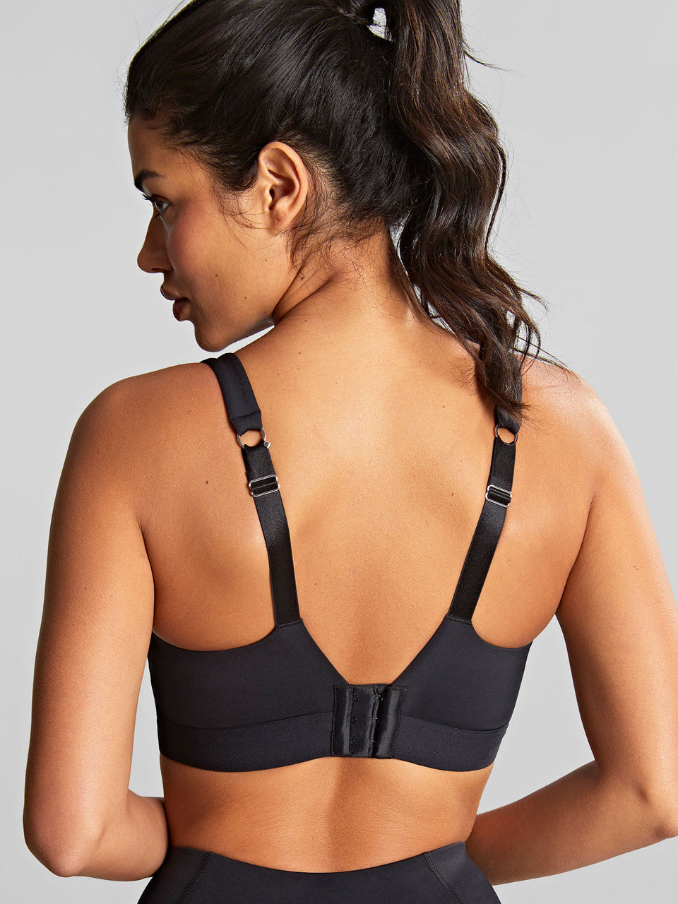 Ultra Perform Non-Padded Wired Sports Bra - Black worn by model back view