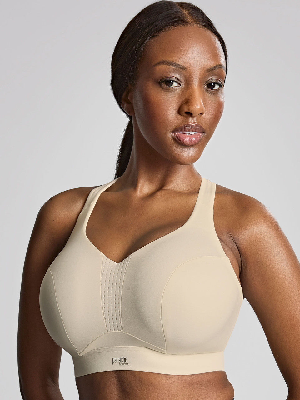 Endurance Non-Padded Wired Sports Bra in Chalk worn by model front view