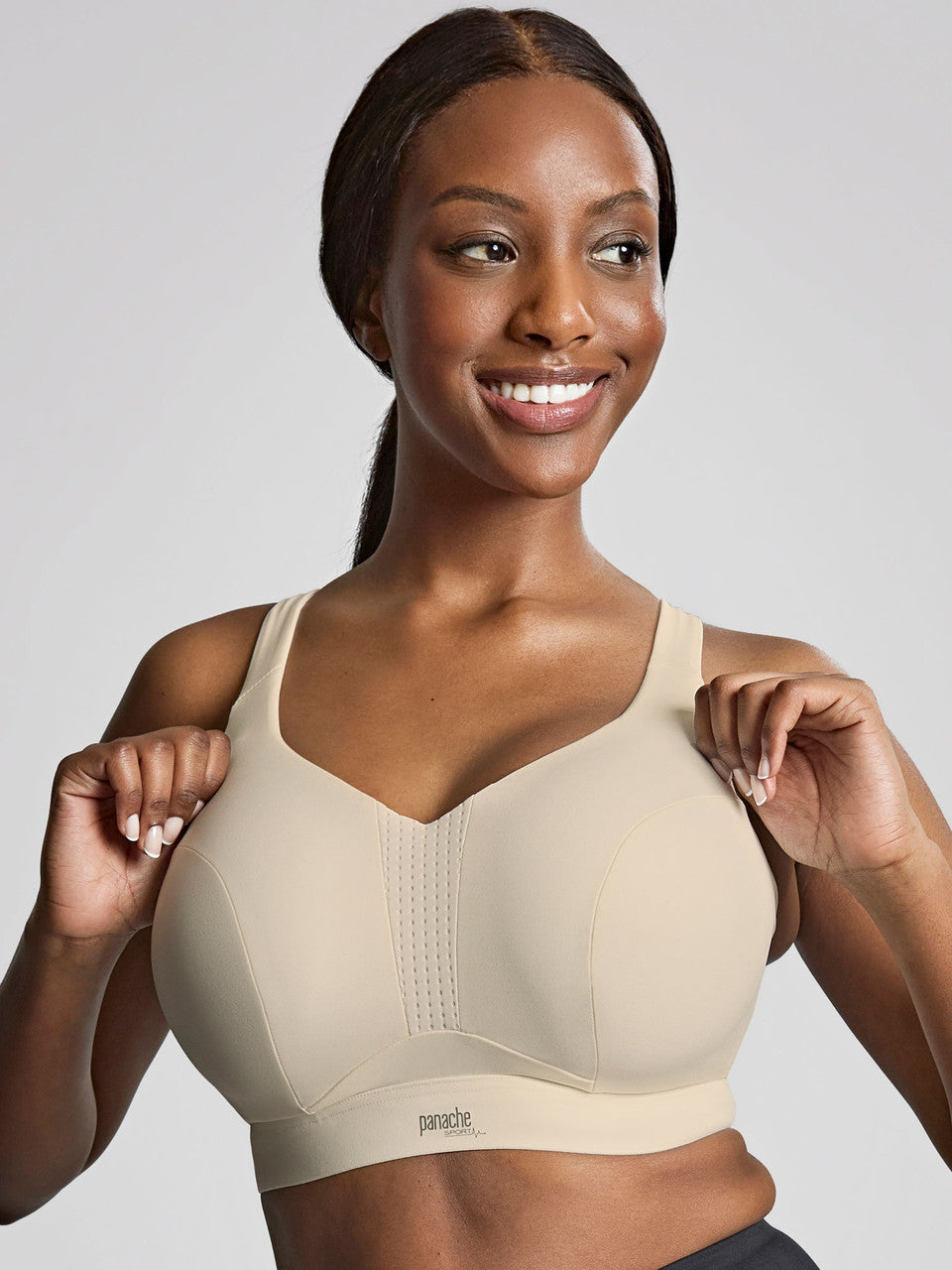 Endurance Non-Padded Wired Sports Bra in Chalk worn by model front view