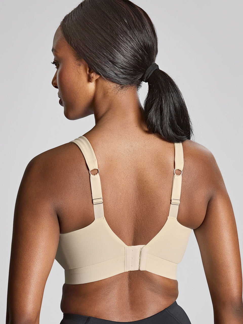 Endurance Non-Padded Wired Sports Bra in Chalk worn by model back view