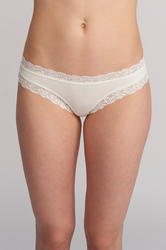 White lace underwear on a plain background