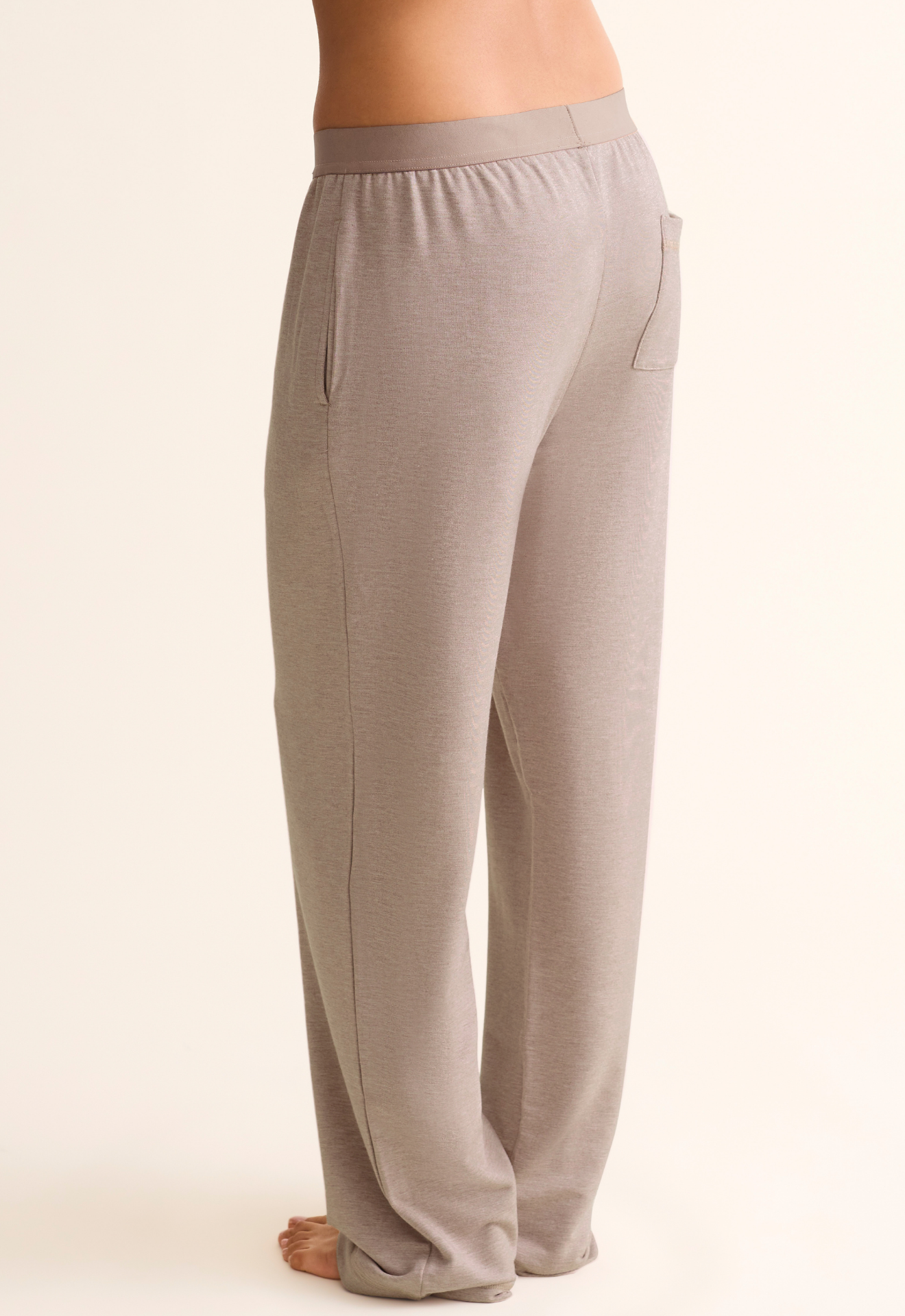 Gray lounge pants on a beige background