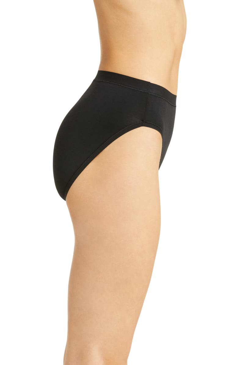 Black high-waisted underwear worn by a person on a white background