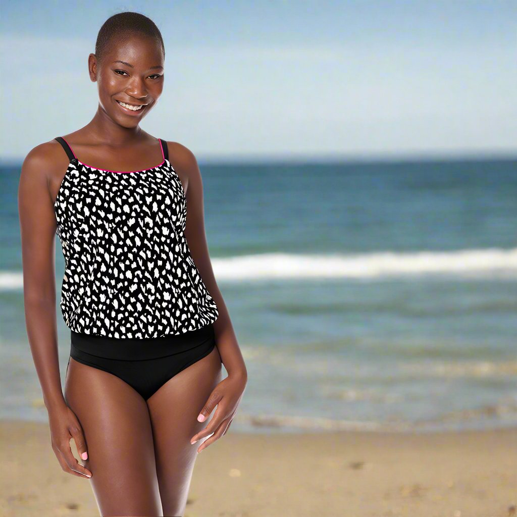 model in post mastectomy tankini on the beach