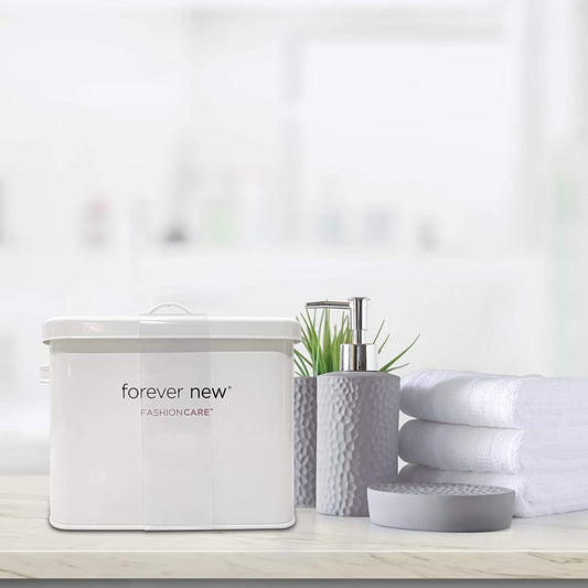 Forever New Laundry Room Tin next to hand soap and towels, lifestyle image