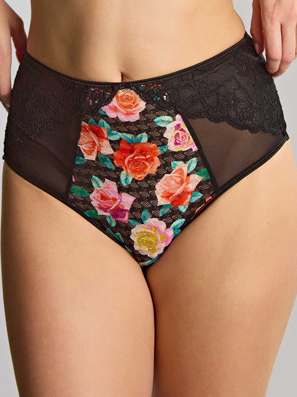 Black lace and mesh panties with a colorful floral print on the front panel, shown on a model.