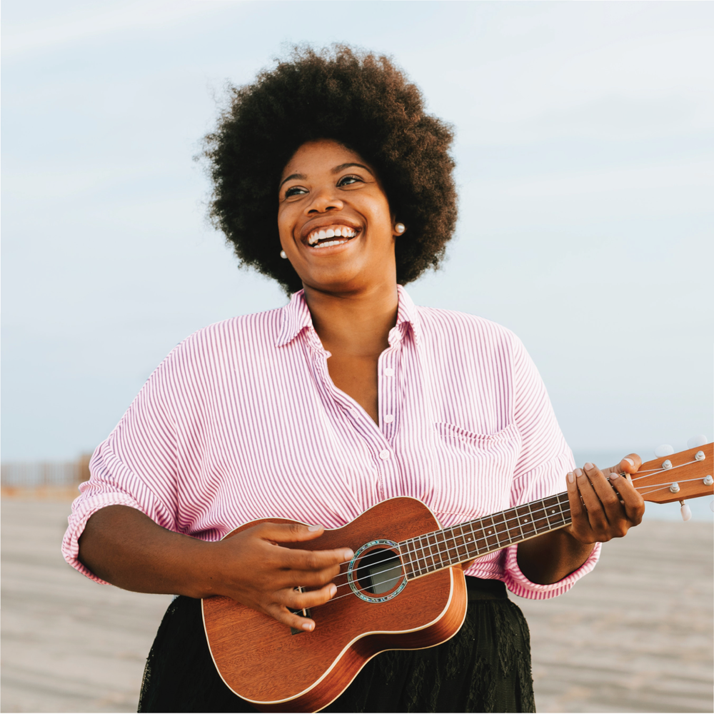 Comfort Shoulder Cushions worn under clothes by woman playing a musical instrument