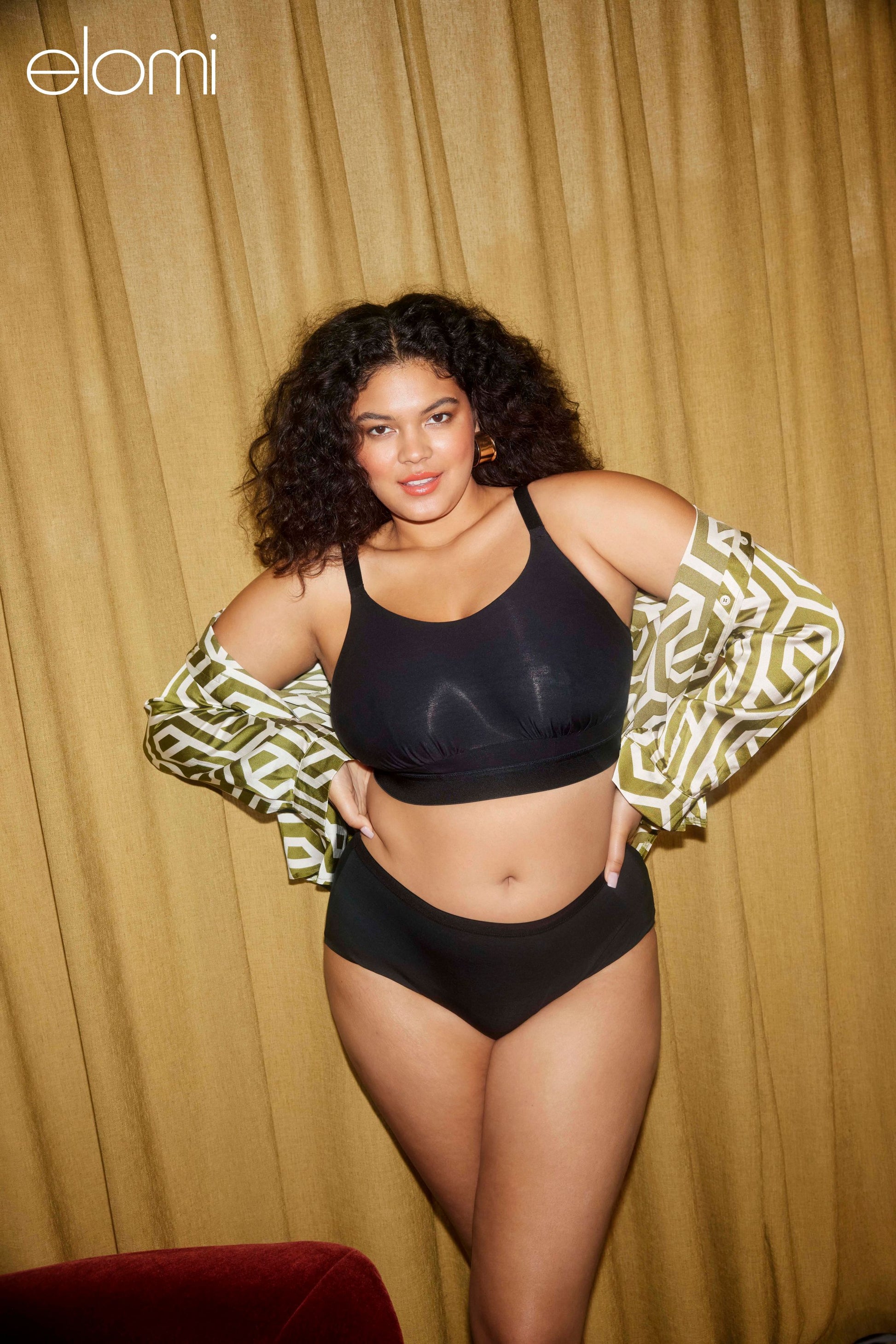 Life Style Shot of Model wearing the downtime bralette in Black 