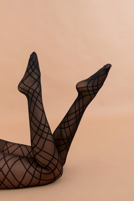 The Lattice Tights worn by model side view