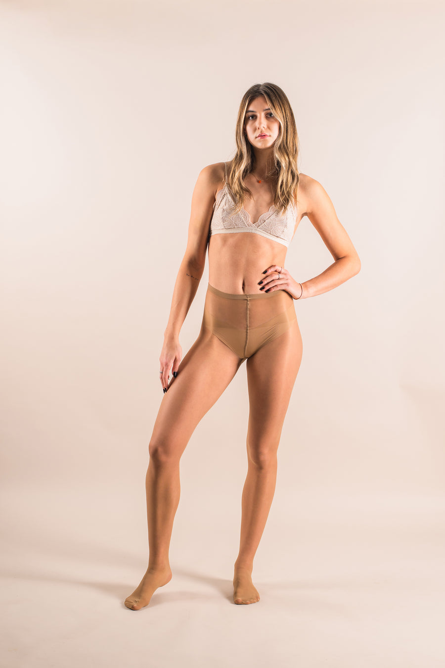 Copy of Sheer To Waist Tights - Tan, worn by model front view