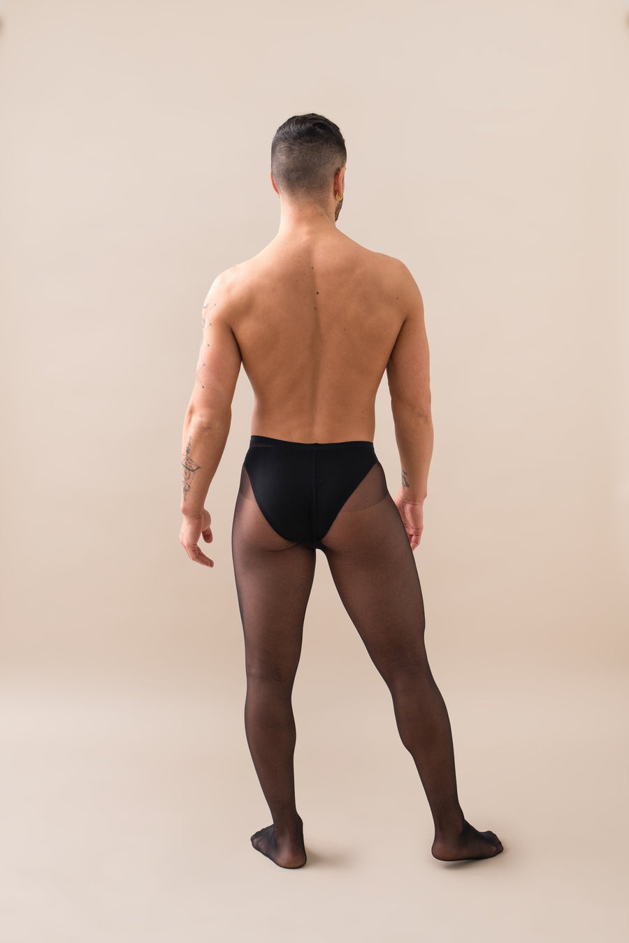Sheer To Waist Tights - Black worn by model back view