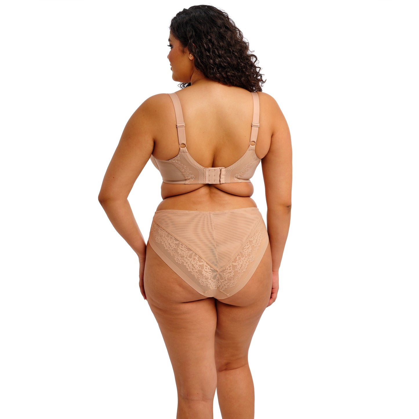 Full body shot of the Model wearing the Nerina Stretch Plunge bra in Sahara view from back