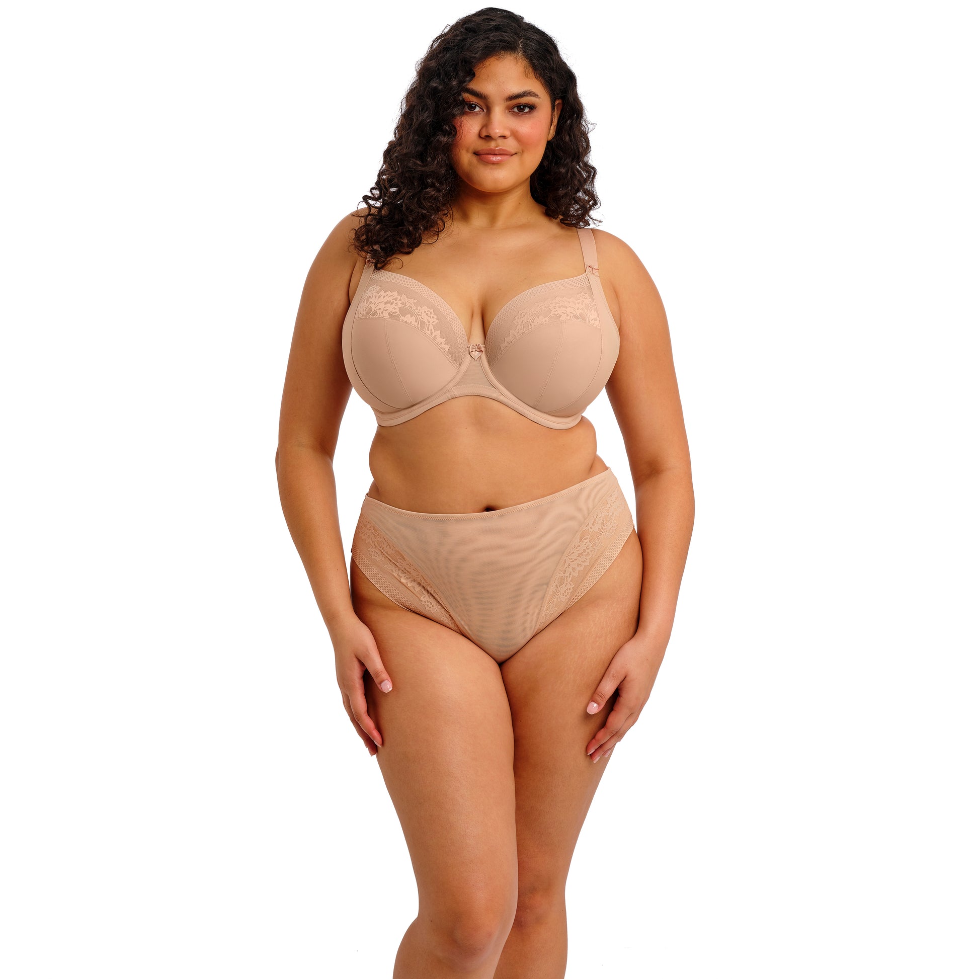 Full body shot of the Model wearing the Nerina Stretch Plunge bra in Sahara