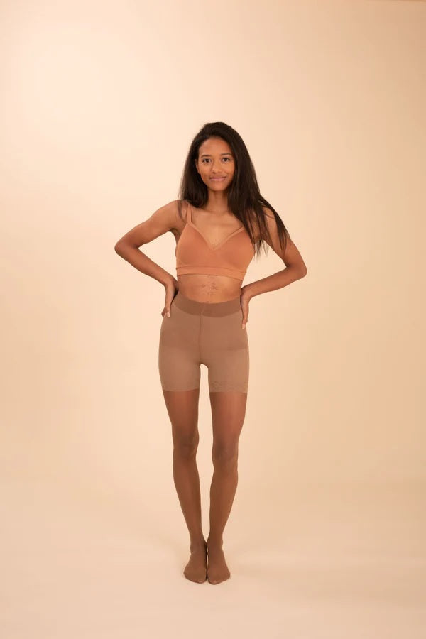 Woman wears Sheer Contour pantihose in Caramel seen from front