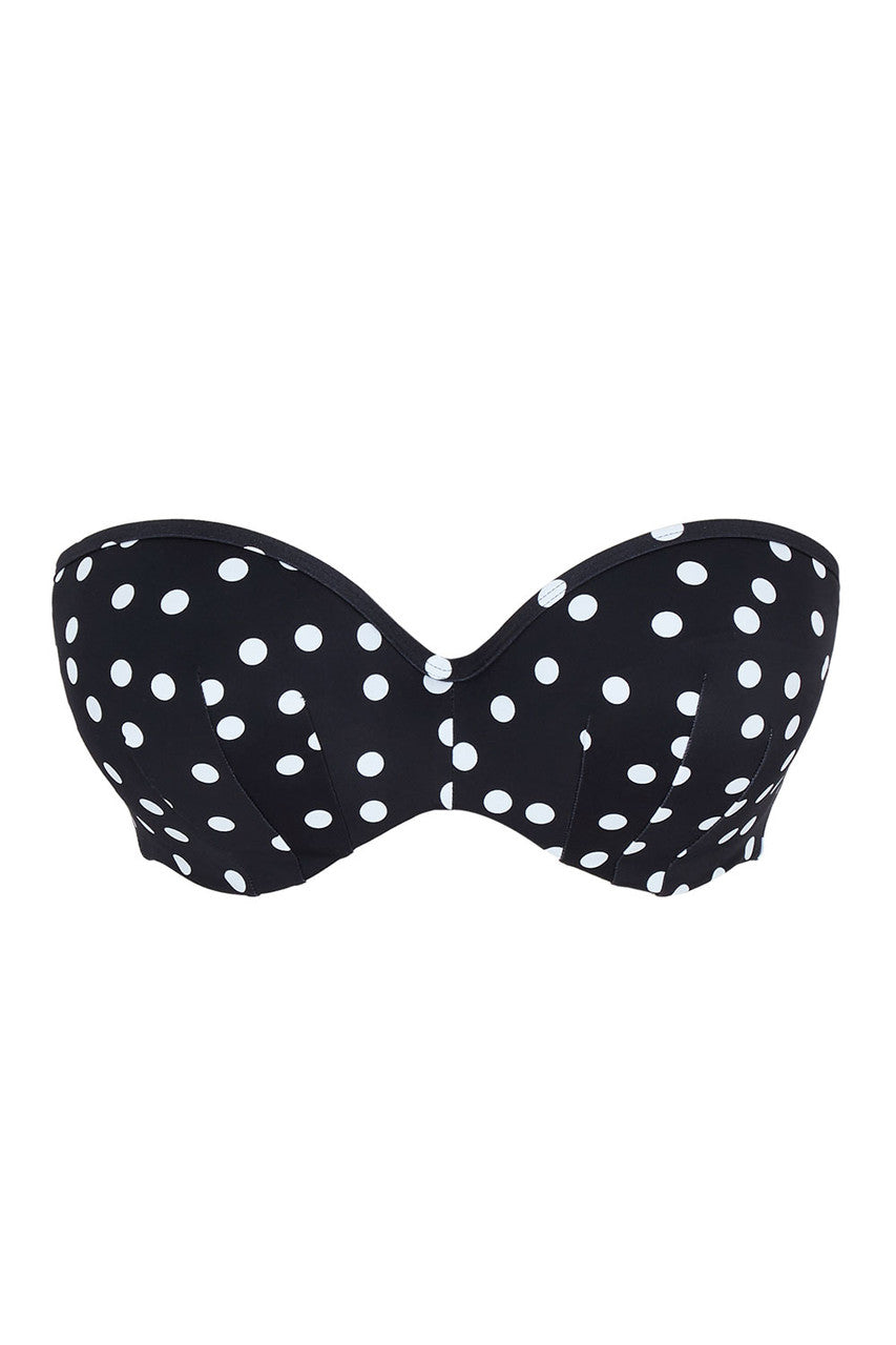 Black bikini top with white polka dots on a white background