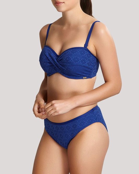 Anya Crochet Twist Bandeau Bikini Top in blue worn by model front view