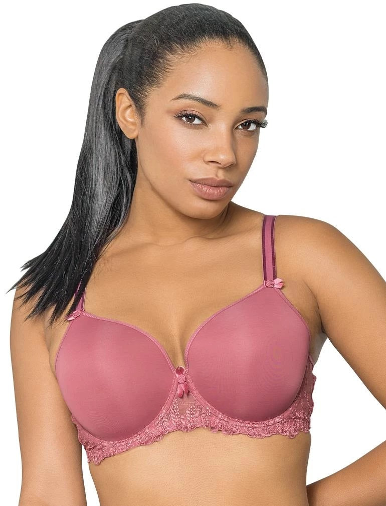Woman wearing a pink bra against a white background