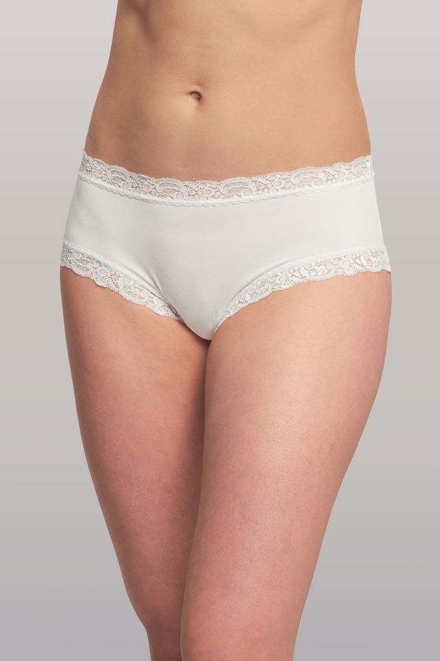 White lace underwear on a plain background