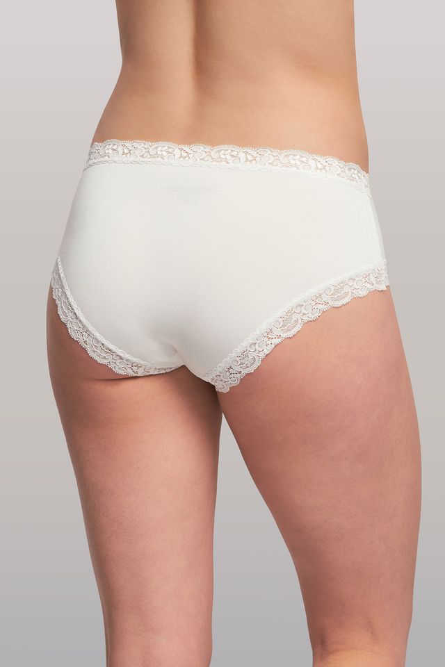 White lace underwear on a plain background