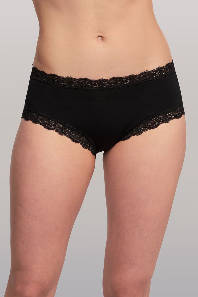 Black lace-trimmed underwear on a plain background